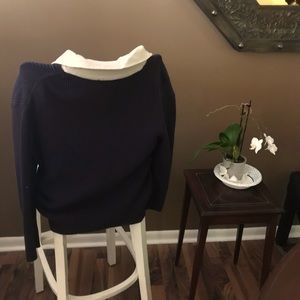 The crew neck false button down top; clean look